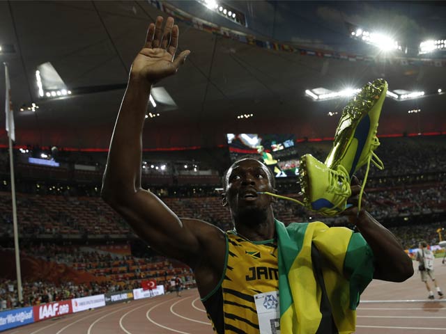 Photo : Usain Bolt Overcomes Justin Gatlin to Win Sprint Double at World Athletics